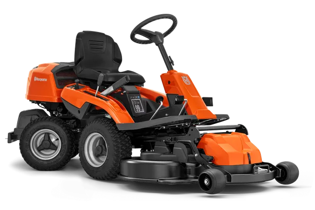 Front view of a ride-on mower with steering wheel and cutting deck.