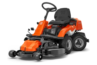 Side view of a Husqvarna ride-on mower with a cutting deck.