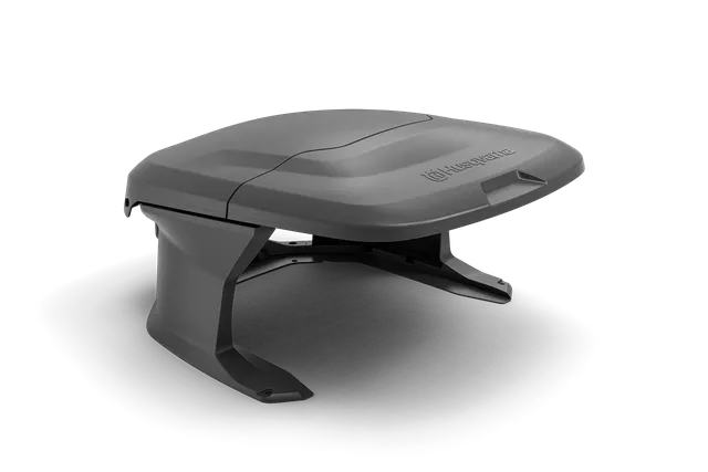 Side view of a robotic lawn mower with a sleek design.