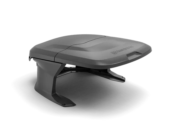 Side view of a Husqvarna robotic lawn mower house.