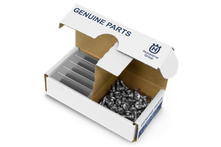 Top view of a box labeled 'Genuine Parts' containing small metal components, with Husqvarna Group branding.