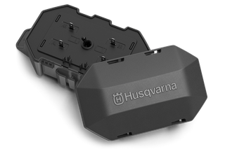 Husqvarna Automower® Gebiedsswitch. Bovenaanzicht van de afdekking van een laadstation voor robotmaaiers van Husqvarna.