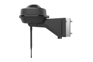 Statybinio jutiklio įtaiso su tvirtinimo laikikliu vaizdas iš šono.