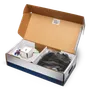 Top view of an opened box containing various installation accessories.