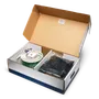 Top view of a box containing various garden accessories including wires and connectors.