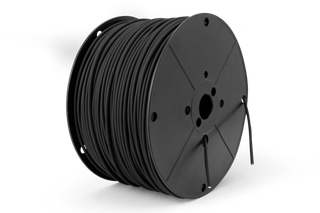 Front view of a large spool of black wire.