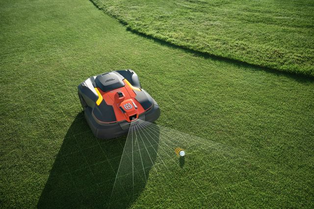 Robotic lawn mower operating in a garden with a satellite signal icon overlay.