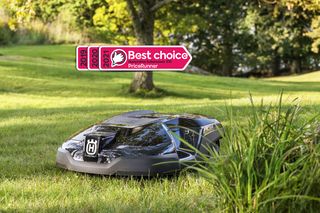 Robotic lawn mower operating in a garden with a 'Best choice' award overlay.