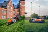 Du robotai vejapjovės, veikiantys žolėtoje aikštelėje, su istoriniu pastatu ir stadiono žibintais fone.