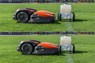 芝生のロボット芝刈り機とラインマーキングマシン