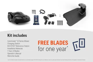 Kit includes a robotic lawn mower, charging station, reference station, installation materials, blades, operator's manual, and welcome guide.