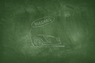 Illustration of a robotic lawn mower with a text bubble saying 'Mulching' on a chalkboard background.