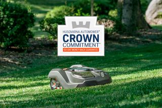 Robotic lawn mower operating in a garden with a promotional overlay about a money-back guarantee.