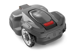 Vista frontal de un robot cortacésped Husqvarna con un botón de parada visible.