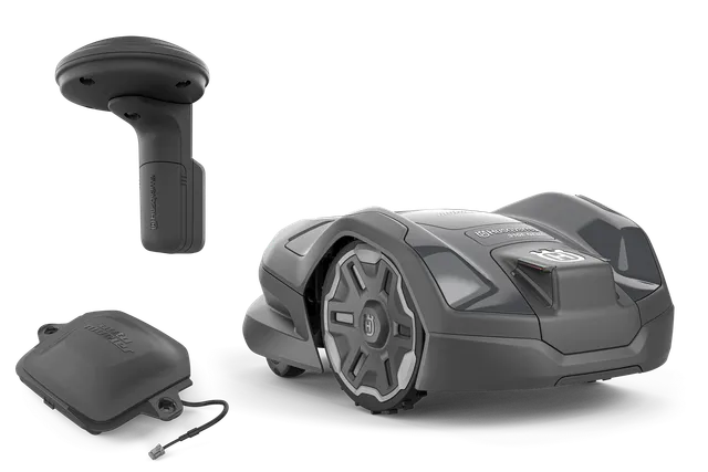 Husqvarna robotic lawn mower with satellite receiver and charging station.
