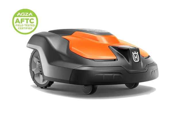 Front-side studio view of a Husqvarna robotic lawn mower with AGZA AFTC certified badge.