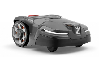 Vista lateral de un robot cortacésped Husqvarna con diseño elegante y ruedas visibles.