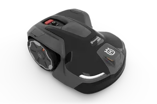 Side view of a Husqvarna robotic lawn mower on a white background.