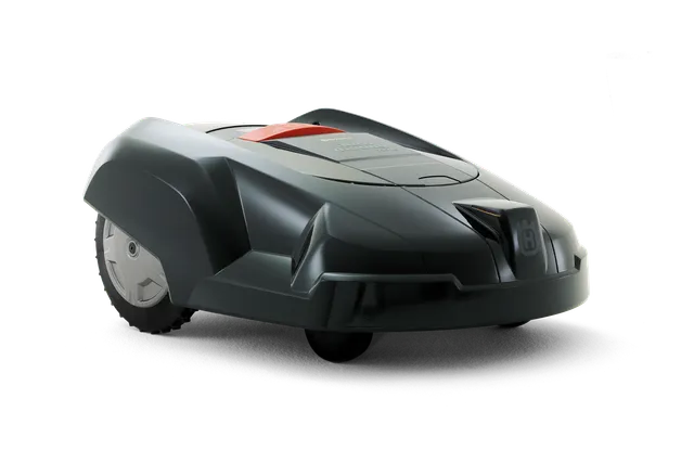 Widok z boku kosiarki automatycznej Husqvarna.