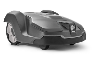 Vue latérale d’un robot tondeuse Husqvarna sur fond blanc.