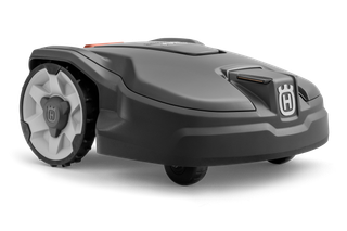 Vue latérale d’un robot tondeuse Husqvarna avec des roues visibles et le logo de la marque.