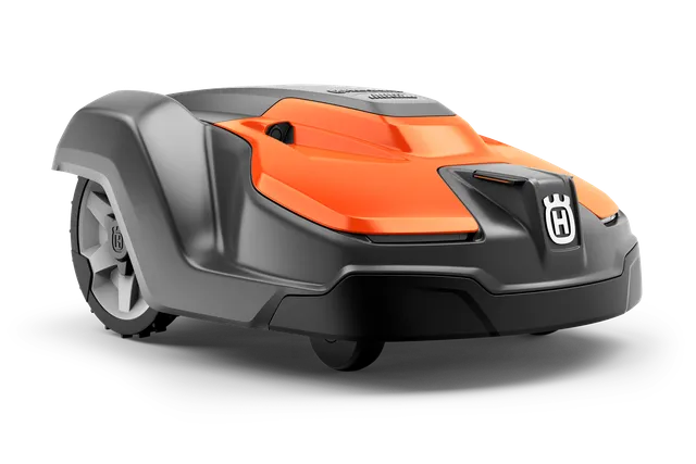 Side view of a Husqvarna robotic lawn mower designed for efficient garden maintenance.