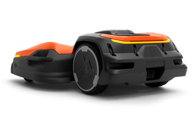Side view of a Husqvarna robotic lawn mower with sleek design.