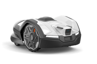 Robotic lawn mower in a studio setting, showcasing its design.