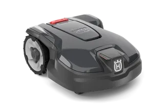 Bočni pogled na Huskvarna robotsku kosilicu sa vidljivim točkovima i kontrolnom tablom.