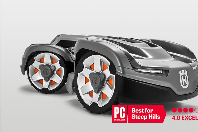 Husqvarna robotic lawn mower with an award badge for excellence on steep hills.