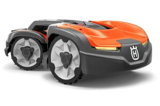 Side view of a Husqvarna robotic lawn mower showcasing its design and wheels.