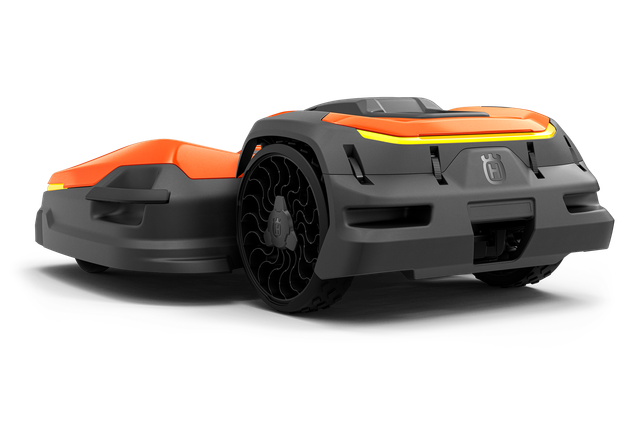 Front view of a robotic lawn mower with sleek design.