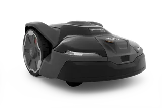 Side view of a Husqvarna robotic lawn mower on a white background.