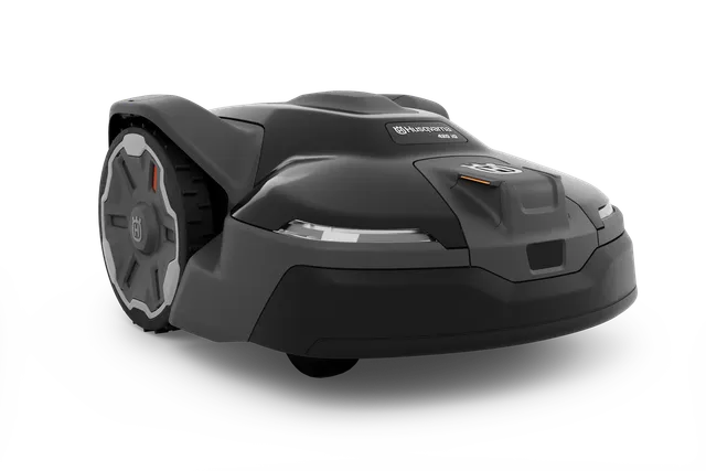 Side view of a Husqvarna robotic lawn mower on a white background.