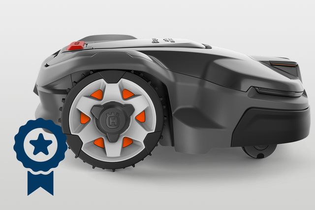 Husqvarna robotniiduki külgvaade koos märgiikooni ülekattega.