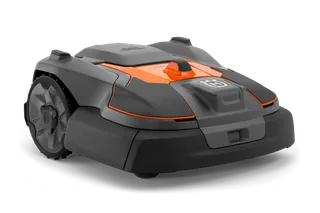 Side view of a Husqvarna robotic lawn mower designed for efficient garden maintenance.