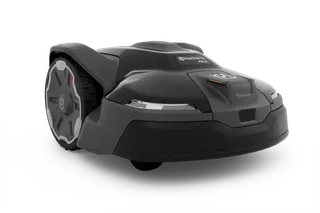 Side view of a Husqvarna robotic lawn mower with sleek design.