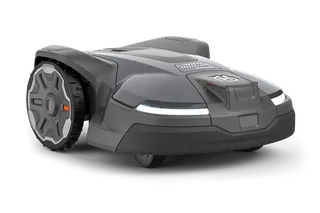 Side view of a Husqvarna robotic lawn mower with sleek design.
