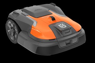 Front view of a robotic lawn mower designed for efficient garden maintenance.