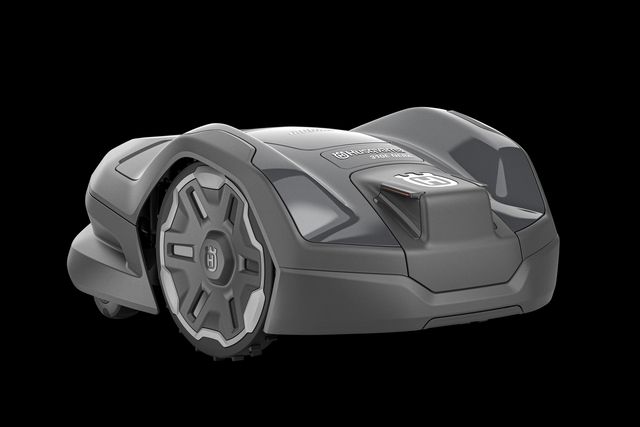 Zijaanzicht van een Husqvarna Automower® 310E NERA-robotmaaier ontworpen voor geautomatiseerd grasmaaien.