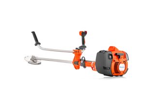 Sett fra siden av en Husqvarna ryddesag med sykkelhåndtak og metallkniv.