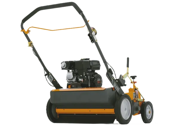 Side view of a lawn mower with visible engine and handlebar.