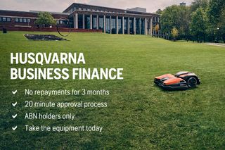 A robotic lawn mower operating on a large lawn with a building in the background and text overlay about Husqvarna Business Finance.
