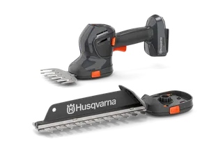 Вигляд спереду ручного садового інструменту Husqvarna зі змінними лезами.