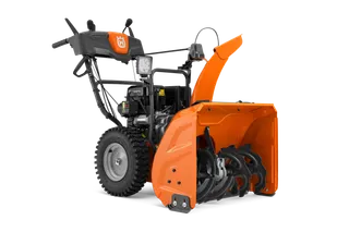 Orange 200-serien Husqvarna bensindrevet snøfreser i studio.