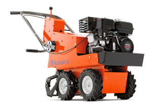 Side view of a Husqvarna commercial front mower with cutting deck.