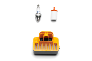 Top view of a spark plug, a fuel filter, and an air filter arranged vertically.