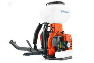 Side view of a Husqvarna backpack sprayer with visible engine components.