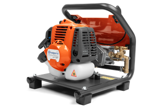 Side view of a Husqvarna water pump with a sturdy frame and visible engine components.