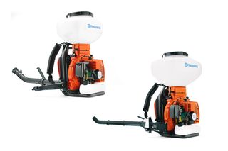 Side view of two Husqvarna backpack sprayers with white tanks and hoses.